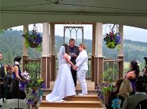 Ralph Fishburn, of Ralph's Regal Weddings performing a wedding ceremony for a same-sex couple at Bliss Hill Event Center, Chattaroy, Washington.
