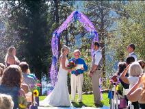 Ralph Fishburn, of Ralph's Regal Weddings, performing wedding at Higgins Point Park, Coeur d'Alene, Idaho.